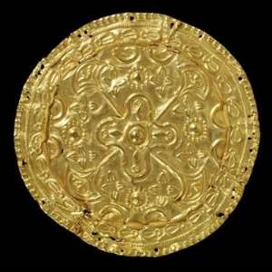 Repouss gold ornament, disk-shaped.