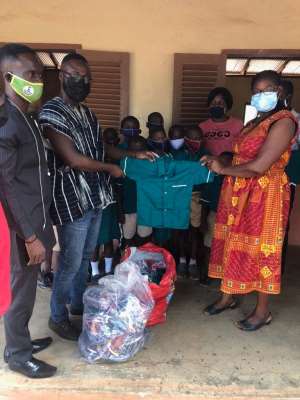 NPP stalwart donates uniforms, PPE to Sunyani West Schools