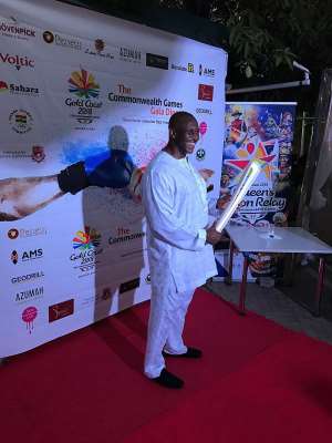 Mr Herbert Mensah, President of Ghana Rugby and Ghana Olympic Committee (GOC) Board Members, holding the Gold Coast 2018 Queen’s Baton at gala dinner in Accra on Sunday 19 March 2017.