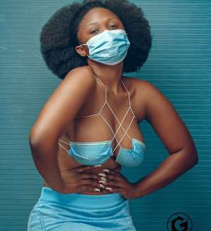 Dezel The Model uses face mask as a bra which looks hot on her PHOTOS