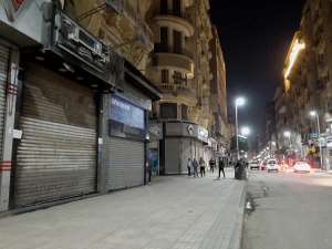 A deserted street in Cairo after the government ordered the closure of shops, restaurants and cafes. - Source: Photo by Ziad AhmedNurPhoto via Getty Images
