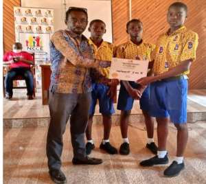 MR. WILLIAMS PRESENTING A CERTIFICATE TO THE VICTORS