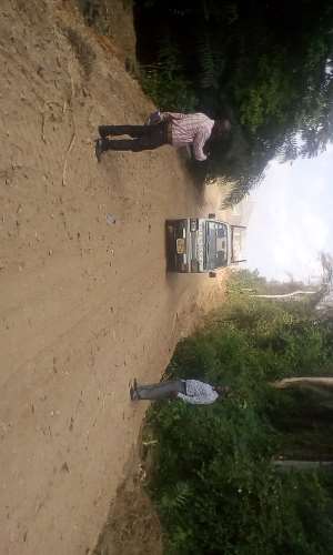 Hon. Dennis Armah Frempong right inspecting one of the road's