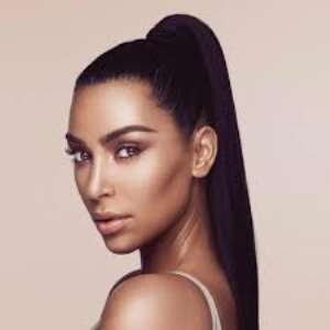 Kim Kardashian Celebrates Solo Vogue Magazine Cover