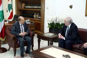 Lebanese President Michel Aoun left and Jacques Cheminade.