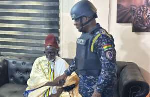 Inspector-General of Police (IGP), Christian Tetteh Yohuno exchanging pleasantries with Bawku Naba, Zug-Raan Asigri Abugrago Azoka II