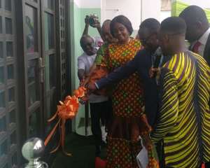 Minister of Tourism, Babara Oteng-Gyasi cuts the tape to open the canteen