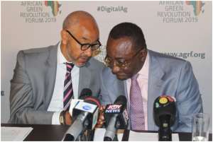 Dr. Owusu Afriyie Akoto in a chat with Mr. Frank Braeken, AGRA Board Member after the launch