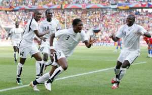 Asamoah Gyan and Sulley Muntari at 2006 FIFA World Cup in Germany