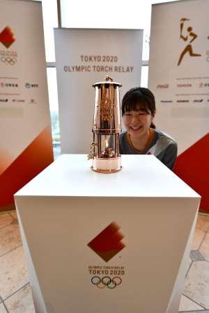 Olympic Flame For Postponed Tokyo 2020 Goes On Display In Fukushima