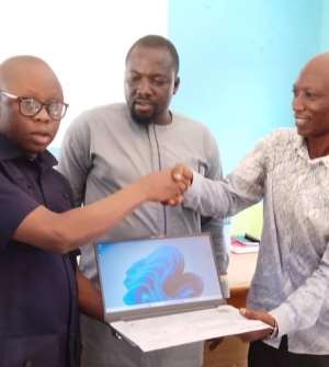 MP donates laptops to Krachi East Municipal Health Directorate