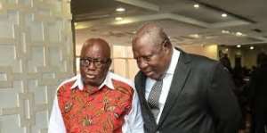 Martin Amidu, Special Prosecutor in suit and President Akufo Addo in a conversation after his swearing in
