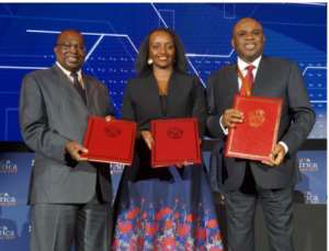 Albert Muchanga, Commissioner for Trade and Industry, African Union left; Soraya Hakuziyaremye, Minister of Trade and Industry of Rwanda centre; and Afreximbank President Prof. Benedict Oramah with the hosting agreement following the signing ceremony in Kigali.