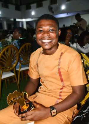 Hon Freeman Kojo Gadiri with his award