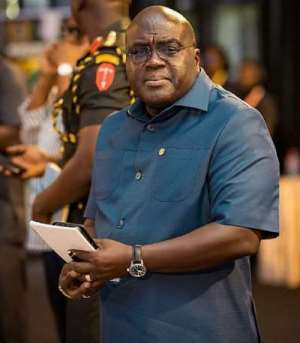 Dr. JULIUS DEBRAH
