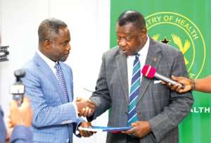 Health Minister receiving the report from investigative committee chair