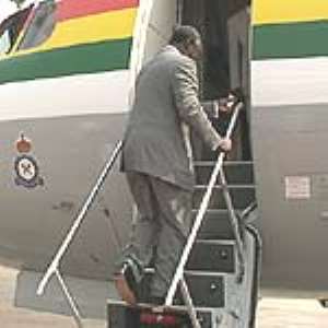 President Kufuor on official visit to Britain.