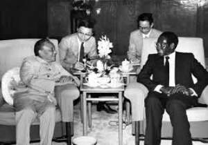 Ex-Chinese leader Deng Xiaoping and Robert Mugabe of Zimbabwe