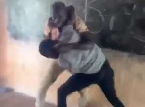 Two teachers fighting in a classroom