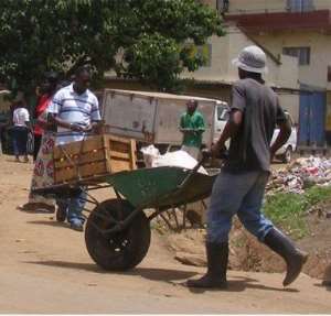 Wheel barrow boys, the necessary evil in Tema