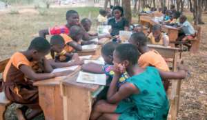 Students learning to read during one of reading clinics organized by OYE Foundation