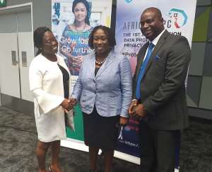 Data Protection Commissioner, Patricia Edusei-Poku middle, flanked by Rita Tsegah and Roland Gyan from Ecobank