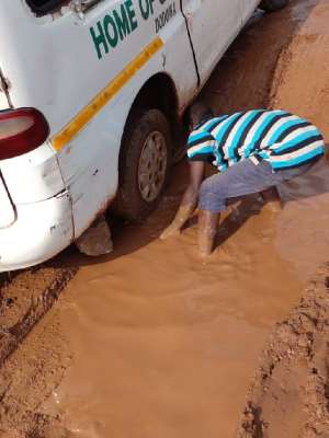 Storm-ravaged Dodowa-Afienya road now mud-trapping cars