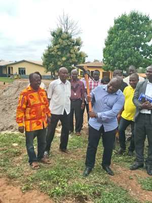 The Municipal Chief Executive Dr Prince Kwakye Afriyie breaking grounds for work to commence