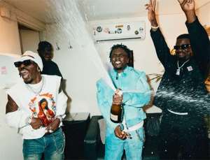 Kweku Smoke in a joyous moment with Sarkodie and Shatta Wale