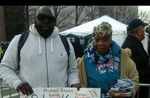 Rashad McCrorey and the mother of Eric Garner at 2014 March on Washington, DC