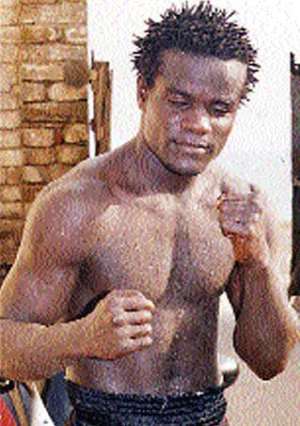 Clottey Holds On for Victory