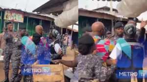 Kwabena Agyekum Banahene, was slapped by a police officer close to a polling station as captured on camera  Photo: Metro TV