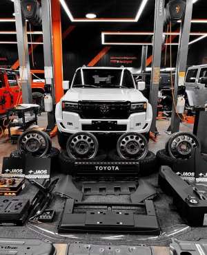 An off-road vehicle awaits modification at a workshop in Hangzhou. Photo: Zhong Jie