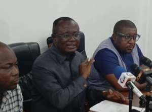Joseph Osei-Owusu (Middle)