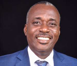 Mr. Michael Kofi Andoh, Acting Commissioner of the NIC