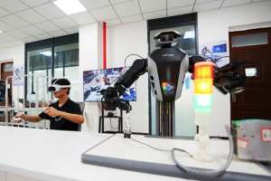 On June 30, 2026, AI-powered education enables students at Sichuan University of Science and Technology to use robots for simulated circuit testing. Photo: CFP