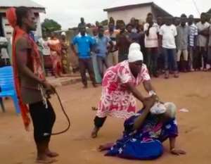 The alleged witch being lynched at Kafabar