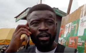GHOne TV reporter Kwabena Agyekum Banahene was covering a local election when a police officer asked him to leave the area and slapped and pushed him. (Screenshot: GhanaWeb/YouTube)