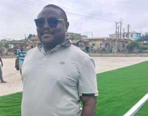 Dr. Minta Nyarku fulfills promise as turf for Obiara Ka Ho Soccer Centre arrives in Cape Coast North
