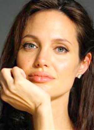 Exhausted Jolie struggles with twin demands