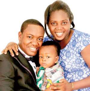 Pastor Ebenezer Kessie with his late wife, Linda Kessie and child