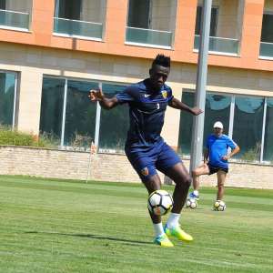 Asamoah Gyan returns to first team training after recovering from back problem