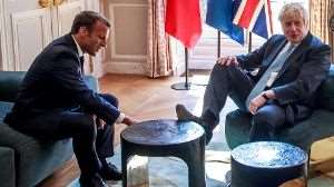 Boris Johnson makes himself comfortable in the company of Emmanuel Macron