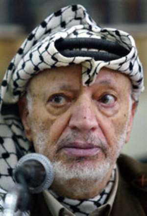 Kufuor signs Book of Condolence for Arafat