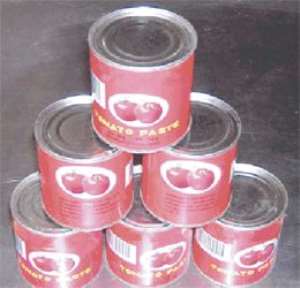 Cans of tomato puree — Their importation stirs controversy.