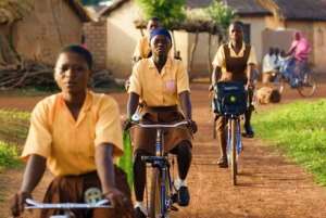 Schoolgirls on bicycles in Ghana, photo credit: UNICEF