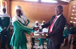 Savelugu Basic Schools Get Learning Materials Support From Izwe Savings And Loans