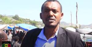 A screenshot of Abay Zewdu, chief editor of YouTube-based Ethiopian broadcaster Amara Media Center, who remains detained after a court granted him bail for September 16, 2022. YouTubeAmara Media Center