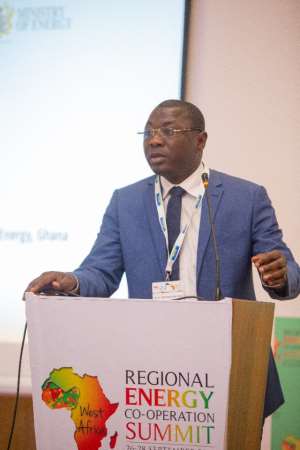 Deputy Minister of Petroleum Mohammed Amin Adam speaking at the Regional Energy Cooperation Summit in Accra Monday.