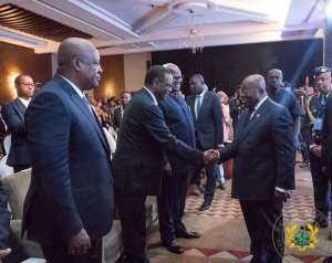 Peace summit handshake; the smile and the look away